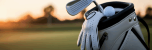 Close-up of golf bag at sunrise.